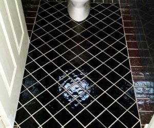 lavatory with dark tiling - tiling newcastle